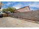 The backyard features a concrete patio area and block wall at 1635 W Dunbar Dr, Phoenix, AZ 85041