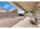 Backyard featuring gravel, patio and a block wall at 1635 W Dunbar Dr, Phoenix, AZ 85041