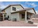 A covered patio and gravel landscaping highlight this backyard at 1635 W Dunbar Dr, Phoenix, AZ 85041