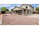 Backyard with covered patio and gravel landscaping for low maintenance at 1635 W Dunbar Dr, Phoenix, AZ 85041
