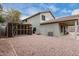 Backyard with covered patio and low maintenance landscaping at 1635 W Dunbar Dr, Phoenix, AZ 85041