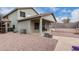 Covered patio and gravel backyard highlight this home's outdoor space at 1635 W Dunbar Dr, Phoenix, AZ 85041