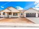 Charming single-Gathering home featuring a neutral color palette, desert landscaping, and a two-car garage at 1645 E Minton St, Mesa, AZ 85203
