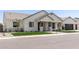 Desirable single-level home featuring a covered entry and an attached two-car garage at 1645 E Minton St, Mesa, AZ 85203