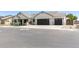 Beautiful single-story home with a neutral color scheme and a spacious three-car garage at 1645 E Minton St, Mesa, AZ 85203