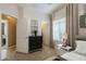 This bedroom features an ensuite bathroom and stylish furniture at 16830 W Magnolia St, Goodyear, AZ 85338