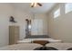 Cozy bedroom featuring neutral walls, a double door closet, and a light-colored dresser at 16830 W Magnolia St, Goodyear, AZ 85338