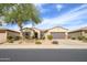 Charming single-story home featuring a low-maintenance yard and a classic desert landscape design at 19140 N Tamarisk Flower Way, Surprise, AZ 85387