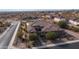 Beautiful aerial view of a Southwestern home featuring a tile roof and desert landscaping at 2224 N 83Rd Cir, Mesa, AZ 85207