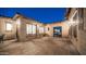 Wide shot of a private courtyard with brick pavers, providing an ideal outdoor living space with ample natural light at 2224 N 83Rd Cir, Mesa, AZ 85207