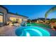 Stunning pool and spa area, with lush landscaping, perfect for relaxing and entertaining outdoors at 2224 N 83Rd Cir, Mesa, AZ 85207