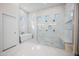 Luxurious bathroom featuring a walk-in shower, freestanding tub, and pristine marble finishes at 2251 N 32Nd St # 10, Mesa, AZ 85213