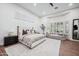Bright bedroom with large windows, a plush king-size bed, and a comfortable lounge area at 2251 N 32Nd St # 10, Mesa, AZ 85213