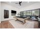 Spacious game room featuring a pool table, a ceiling fan, and glass sliding doors at 2251 N 32Nd St # 10, Mesa, AZ 85213