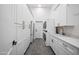 Functional laundry room featuring a washer, dryer, and ample storage cabinets at 2251 N 32Nd St # 10, Mesa, AZ 85213