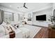 Comfortable living room with large sectional sofa, fireplace, and built-in cabinetry at 2251 N 32Nd St # 10, Mesa, AZ 85213
