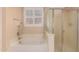 Bathroom soaking tub and glass shower offer a spa-like retreat at 2263 E Jade Ct, Chandler, AZ 85286