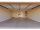Spacious garage with epoxy flooring, a water heater and storage at 2263 E Jade Ct, Chandler, AZ 85286