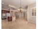 Spacious living room with kitchen and large sliding glass doors provide lots of natural light at 2263 E Jade Ct, Chandler, AZ 85286