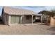 Cozy backyard with a covered patio and desert landscaping at 24638 N 65Th Ave, Glendale, AZ 85310