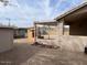 A backyard featuring an outdoor kitchen and desert landscaping at 24638 N 65Th Ave, Glendale, AZ 85310