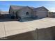 Charming home with a well-maintained front yard and a wide driveway for ample parking at 24638 N 65Th Ave, Glendale, AZ 85310