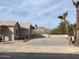 Charming single-story home with a well-manicured yard and a spacious driveway at 24638 N 65Th Ave, Glendale, AZ 85310