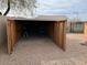 Open storage area with gravel and shelving at 24638 N 65Th Ave, Glendale, AZ 85310