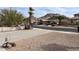 A quiet street view featuring desert landscaping and a mountain backdrop under a clear blue sky at 24638 N 65Th Ave, Glendale, AZ 85310