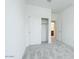 Well-lit bedroom with plush carpeting and a closet at 2663 S Equestrian Dr # 106, Gilbert, AZ 85295