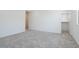 Spacious bedroom features neutral carpet and includes a view of the closet and hall areas at 2663 S Equestrian Dr # 106, Gilbert, AZ 85295