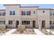 Inviting townhome featuring desert landscaping, neutral tones and symmetrical design at 2663 S Equestrian Dr # 106, Gilbert, AZ 85295