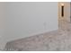 Minimalist bedroom featuring neutral carpet and natural light at 2663 S Equestrian Dr # 106, Gilbert, AZ 85295