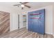 Bedroom with a modern ceiling fan, a closet, and a fold out bed at 340 E Harwell Rd, Gilbert, AZ 85234