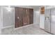 Dining Room with accent wooden paneling, recessed lighting, and gray wood-look floors at 340 E Harwell Rd, Gilbert, AZ 85234