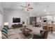 Inviting living space featuring a comfortable living room flowing into dining and kitchen areas at 340 E Harwell Rd, Gilbert, AZ 85234