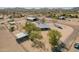 Aerial view of a desert home and property, featuring horse facilities and RV parking at 35844 N 12Th St, Phoenix, AZ 85086