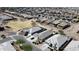 A high angle captures a neighborhood with well-maintained landscaping and community spaces, highlighting the peaceful surroundings at 36070 N Quiros Dr, San Tan Valley, AZ 85143