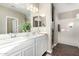 Bathroom with double vanity, and walk in shower at 36070 N Quiros Dr, San Tan Valley, AZ 85143