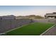 Private backyard with green lawn and views of the mountains at 37200 N Cave Creek Rd # 1035, Scottsdale, AZ 85262