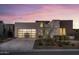 Stunning contemporary home showcasing clean lines, mixed materials, and a stylish garage door at 37200 N Cave Creek Rd # 1035, Scottsdale, AZ 85262