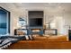 Cozy living room featuring a modern fireplace, comfortable seating, and elegant decor at 37200 N Cave Creek Rd # 1035, Scottsdale, AZ 85262