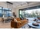 Bright open living area with modern decor, dining space, and seamless indoor-outdoor flow at 37200 N Cave Creek Rd # 1035, Scottsdale, AZ 85262