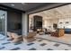 Inviting living area with an outdoor patio featuring comfortable seating and a modern fireplace at 37200 N Cave Creek Rd # 1035, Scottsdale, AZ 85262