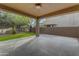 Spacious back patio area with artificial turf at 3777 E Latham Ct, Gilbert, AZ 85297