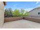 Large private balcony with stucco walls, a metal railing, and views of the surrounding trees and blue sky at 3777 E Latham Ct, Gilbert, AZ 85297