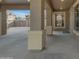 Open carport with view of fenced yard and basketball hoop, with block pillars and an open layout at 3777 E Latham Ct, Gilbert, AZ 85297