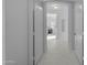 Bright hallway with white walls and marble floors leading to a bedroom with natural light at 3777 E Latham Ct, Gilbert, AZ 85297