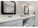 Stylish bathroom with double sinks, white countertop and a vanity area at 3832 W Eva St, Phoenix, AZ 85051