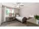 Charming bedroom features a vanity and a window with an outside view at 3832 W Eva St, Phoenix, AZ 85051